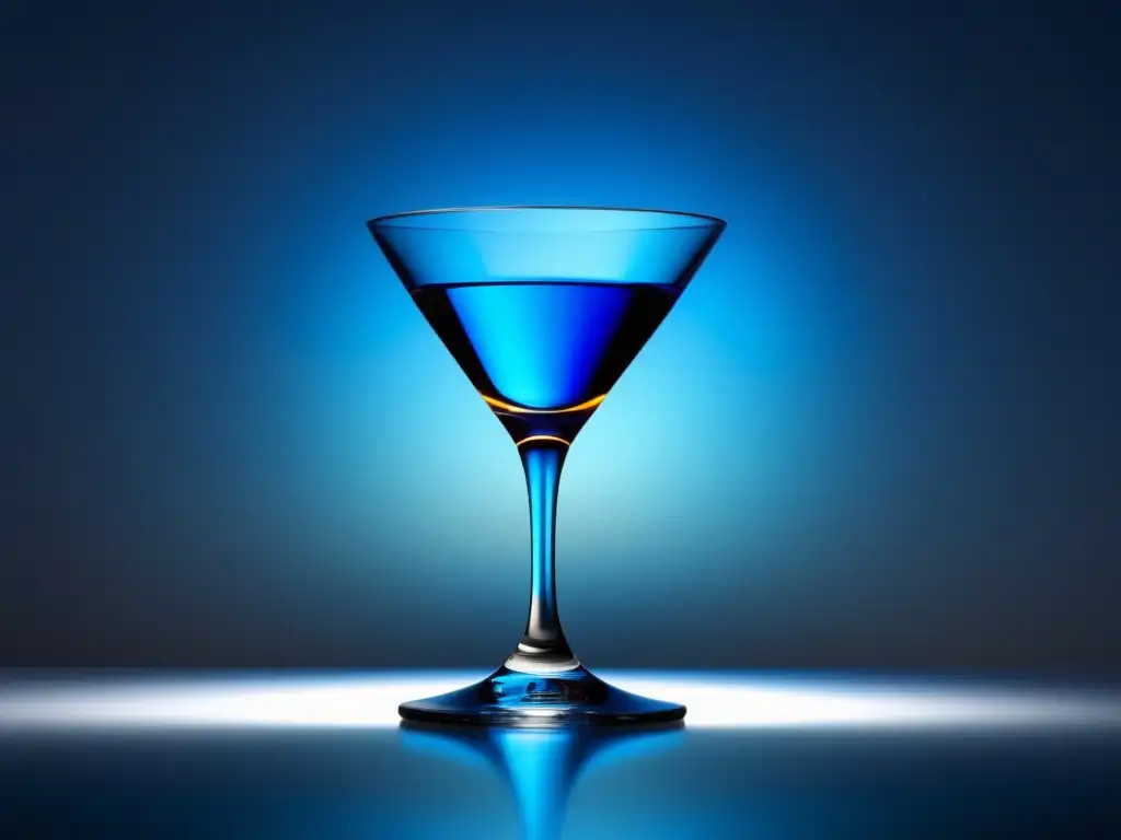 Imagen: Cóctel Corpse Reviver: Elegancia minimalista y misterio en un vaso azul vibrante